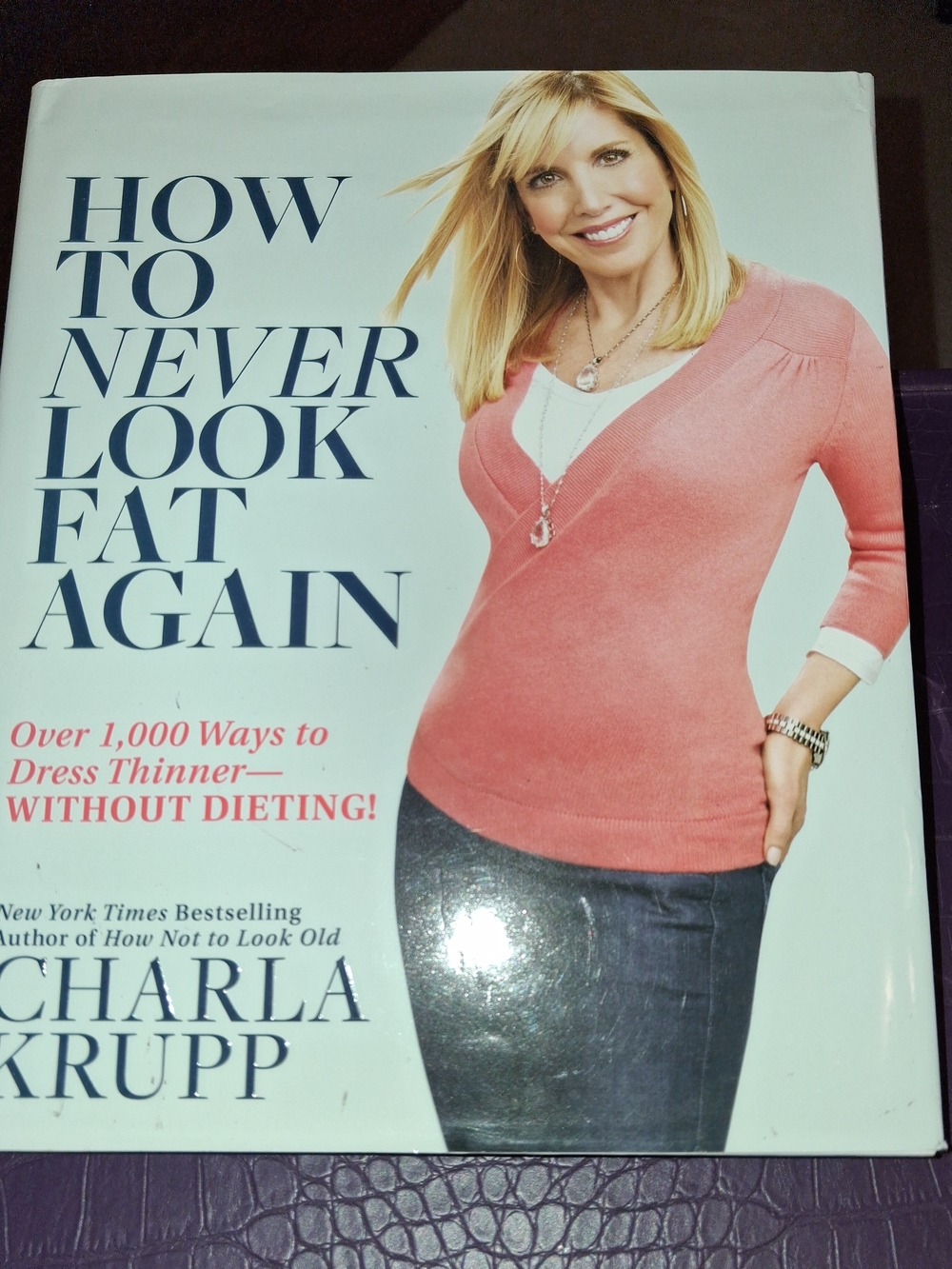 How to Never Look Fat Again by - Pink Cover